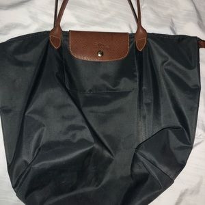 Used long champ purse teal/navy blue